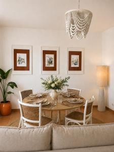 a dining room with a table and chairs at Iconic Vila d'Obidos in Óbidos