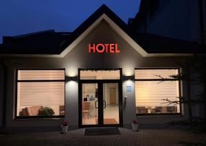 a hotel sign on the front of a building at Annabella in Riga