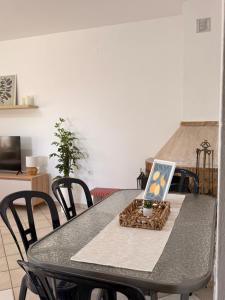 a table with a book on top of it at The Family Villa in Tragasiá +25 photos