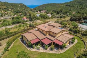 an aerial view of a house with a roof at Tra Cielo e Mare Rooms Rio Marina in Rio nellʼElba