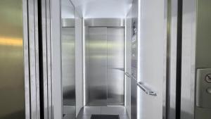 a stainless steel refrigerator in a room at Alter Kornspeicher in Havelberg +128 photos