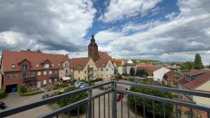 a view of a town from a balcony at Alter Kornspeicher in Havelberg