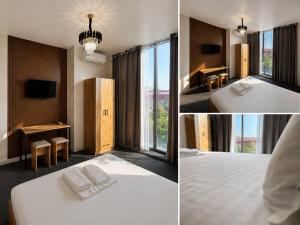 a hotel room with a bed with two towels on it at Ameli Plaza Hotel Tashkent in Yakkasaray +16 photos
