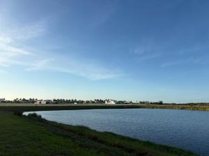 a large body of water in a field at Coastal Life at Aqua in Bradenton