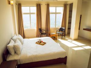 Katil atau katil-katil dalam bilik di Hotel Ariel