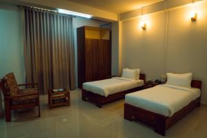 Katil atau katil-katil dalam bilik di Hotel Ariel