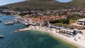 an aerial view of a beach with boats in the water at Ilma Apartment in Trogir