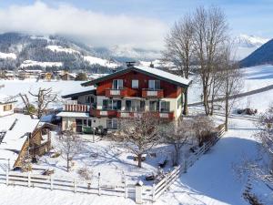 an aerial view of a house in the snow at Panoramahaus Itter in Itter