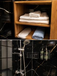 a bathroom with a shower and towels on a shelf at Hotel Mara İstanbul in Istanbul +33 photos