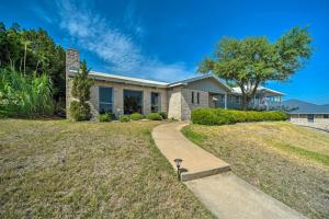 a house with a walkway in front of it at Snowbird-Friendly House with Game Room, Full Kitchen, Balcony & W/D in Kerrville