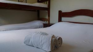 En eller flere senge i et værelse på Hotel Madrid