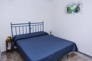 Posteľ alebo postele v izbe v ubytovaní Elpidios Galatro Terme