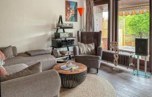 a living room with a couch and chairs and a table at Amazing Home In Meschede With Wifi in Meschede