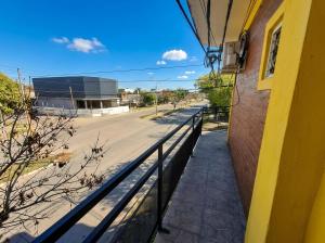 a view of a street from a balcony of a building at Departamentos Marconi 1B in Resistencia