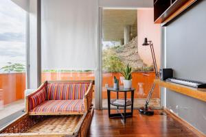 a living room with a couch and a table at Keam House in Santana
