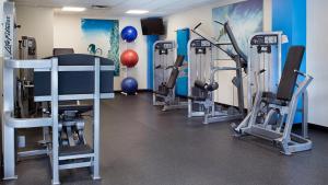 a gym with several treadmills and cardio machines at Mountain Valley Lodge Resort Studio Villa in Breckenridge