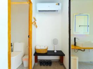 a bathroom with a black table and a sink at Sky Sakad Sunset at Doi Sakad, Nan in Ban Pha Hu