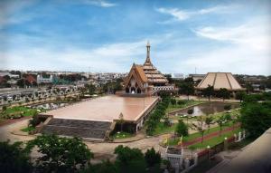 a large building with a tower in a city at Jr - House 2 34-103 in Ban Talat Rangsit