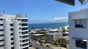 a view of the ocean from a building at The Pinnacles Caloundra Unit 92 in Caloundra