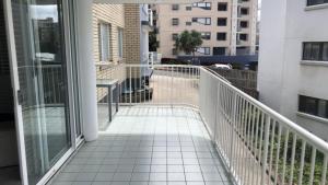 a balcony with a view of a building at Spinnaker Seas Unit 2 in Caloundra