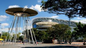 two metal structures in front of a building at Olympicpark 12 Free Parking in Sydney