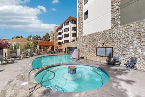 a swimming pool in front of a building at GL306 Butte Gem in Crested Butte