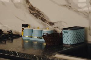 a kitchen counter with at Nomad Guest House Osh in Osh