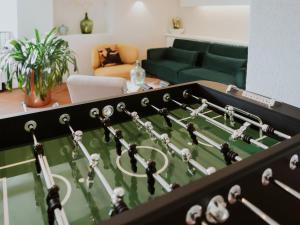 a large chess board in a living room at MYA Weinland Hotel Kobern-Gondorf in Kobern-Gondorf