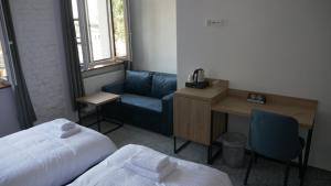 Postel nebo postele na pokoji v ubytování Hostel Pyskowice