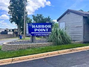 a sign for a harper point sign on the side of a street at LOTO fun at 21 Lakeview Condo in Osage Beach