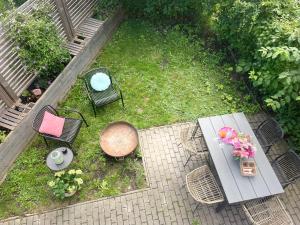 an aerial view of a patio with a table and chairs at Appartement Morgensonne in Egling