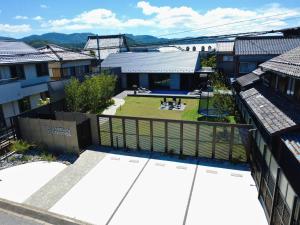 an aerial view of a building with a yard at LAKE villa CHITOSE in Hikone