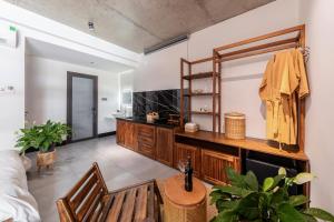 a living room with a couch and a table at ANZ Apartment in Tuy Hoa