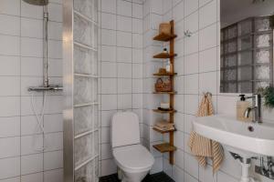 a bathroom with a toilet and a sink at Dream view in Åre Björnen in Åre +13 photos