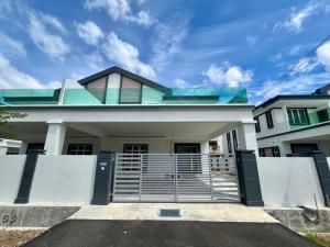 a house with a gate in front of it at Caro Home in Malacca