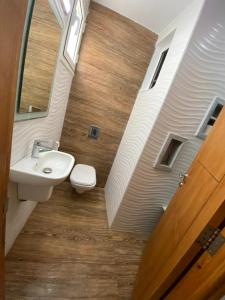 a bathroom with a sink and a toilet at kelibia in Kelibia