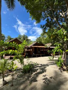 a view of the resort from the beach at Kemmi Homestay Raja Ampat in Merpati
