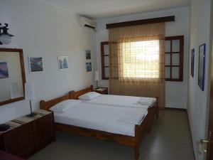 Ένα ή περισσότερα κρεβάτια σε δωμάτιο στο Villa Oasis