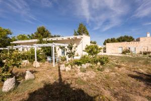 a garden in front of a house at Tenuta Monsalvato in Otranto