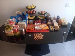a table filled with different types of food at Casa Floris in Imola