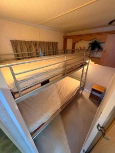 an overhead view of a bunk bed in a room at Zeester 91 in Scherpenisse