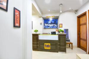 a lobby of a hospital with a reception desk at FabHotel The Lalit Vibes - Nr DLF Phase 2 & MG Road Metro in Gurgaon