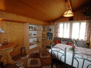 Postel nebo postele na pokoji v ubytování holiday home in Wilderswil with garden + 9 fotografií