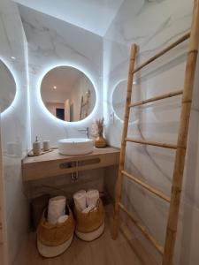 a bathroom with a sink and a mirror at Aromas del Jiloca, la Trufa Negra in Calamocha +41 photos