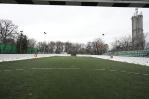 an empty soccer field with snow on the ground at Fürdőkerti Ifjúsági Szálló in Hajdúböszörmény