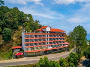 a hotel on the side of a hill at Ginger Lansdowne, Mall Road in Lansdowne