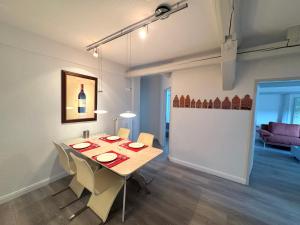 a dining room with a table and some chairs at Brauhaus Suite 19 in Sebnitz