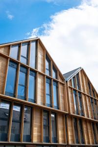 an office building with windows on the side of it at Micklegate by Supercity Aparthotels in York