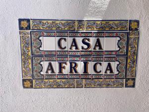 a sign that says casa africa on a wall at Guest Wing at Casa Africa in Lorca