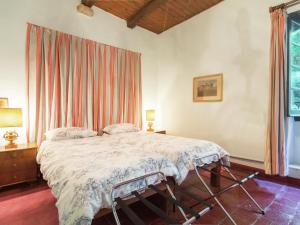 Postel nebo postele na pokoji v ubytování Apartment in Cut Monferrato with garden